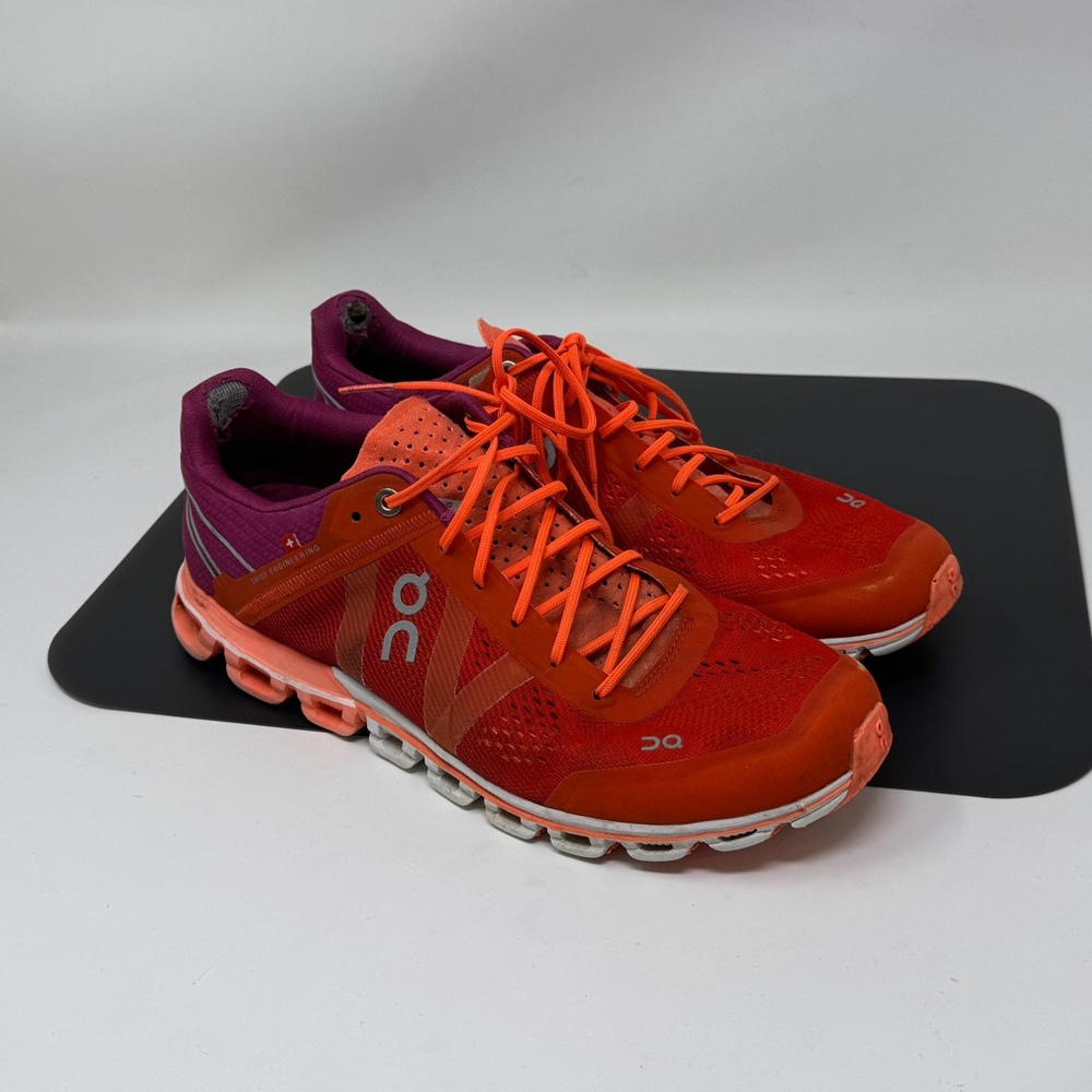 On Cloud Cloudflow orange and purple athletic shoes worn